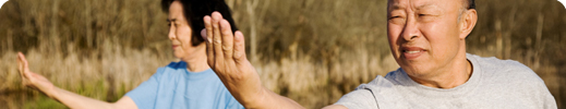 Asian couple exercising at park.