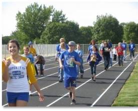 Students from Baltic High School took to the tracks for a mile-long walk during the We Can! Have a Healthy Homecoming! event series