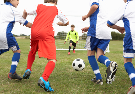 Kids playing soccer