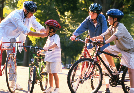 Family riding bikes