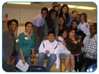 A group of middle-school students forms a "human pyramid"